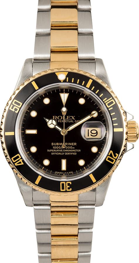 black and gold rolex submariner